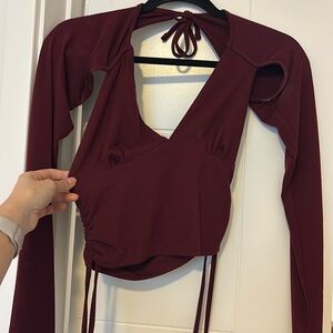 Cut out, wine colored long sleeve top